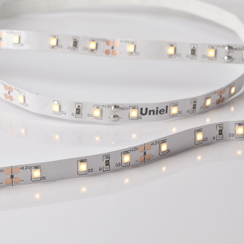 Светодиодная лента Uniel ULS-M11-2835-60LED/m-8mm-IP20-DC12V-4,8W/m-5M-3000K PROFI катушка в герметичной упаковке